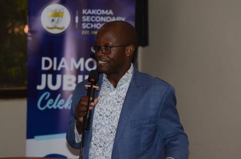 Board Chairman Dr. Isaac Nsereko addresses guests during the Old Students' Diamond Jubilee fundraising dinner.
